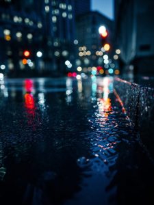 bokeh lights wet gutter street gutter street pavement sidewalk bokeh lights night dark urban city city lights nature night photography street photography rain