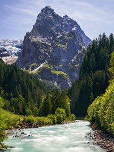 What is black when it’s clean and white when it’s dirty? mountains river forest nature water switzerland landscape