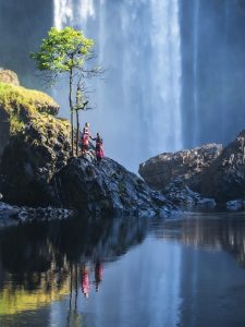 I am invisible, yet you can’t live without me. I’m abundant, yet I’m scarce. What am I? waterfall forest highlands nature river landscape